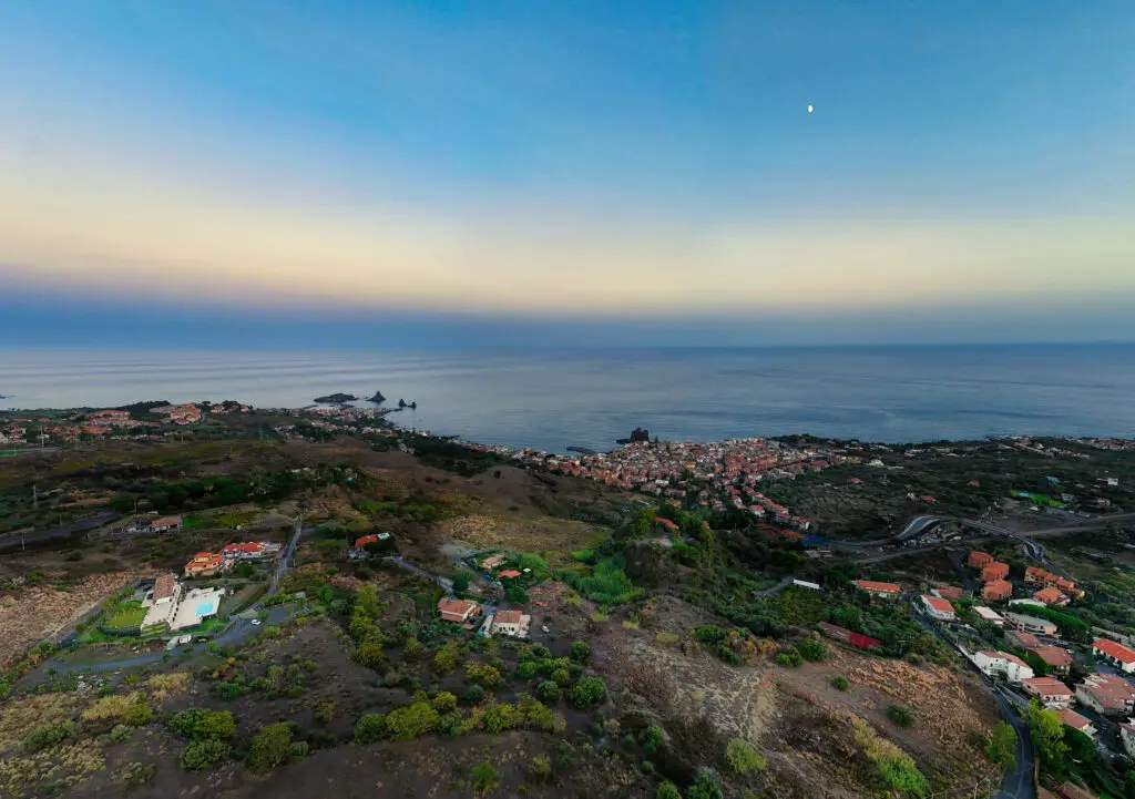 DJI Mini 4 Pro: Wide-angle panorama of a seaside village in East Sicily