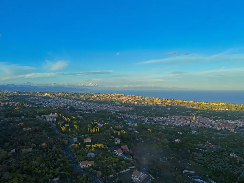 DJI Mini 4 Pro: 48MP JPEG image of the town of Acireale in Sicily