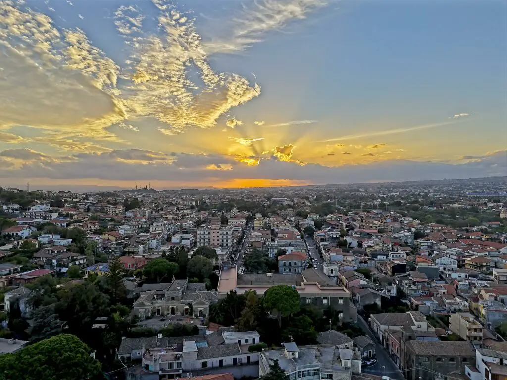DJI Mini 4 Pro: image merged to HDR of a sunset with the sun partially covered by clouds