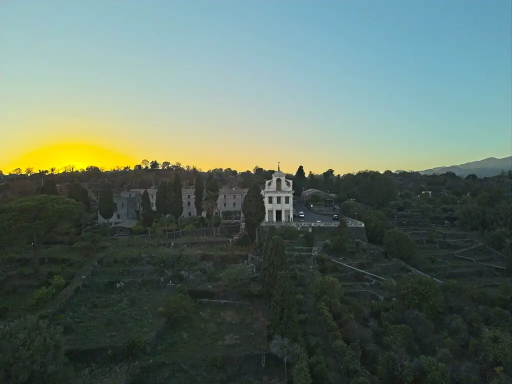 DJI Mini 4 Pro. Single image of a monastery at sunset