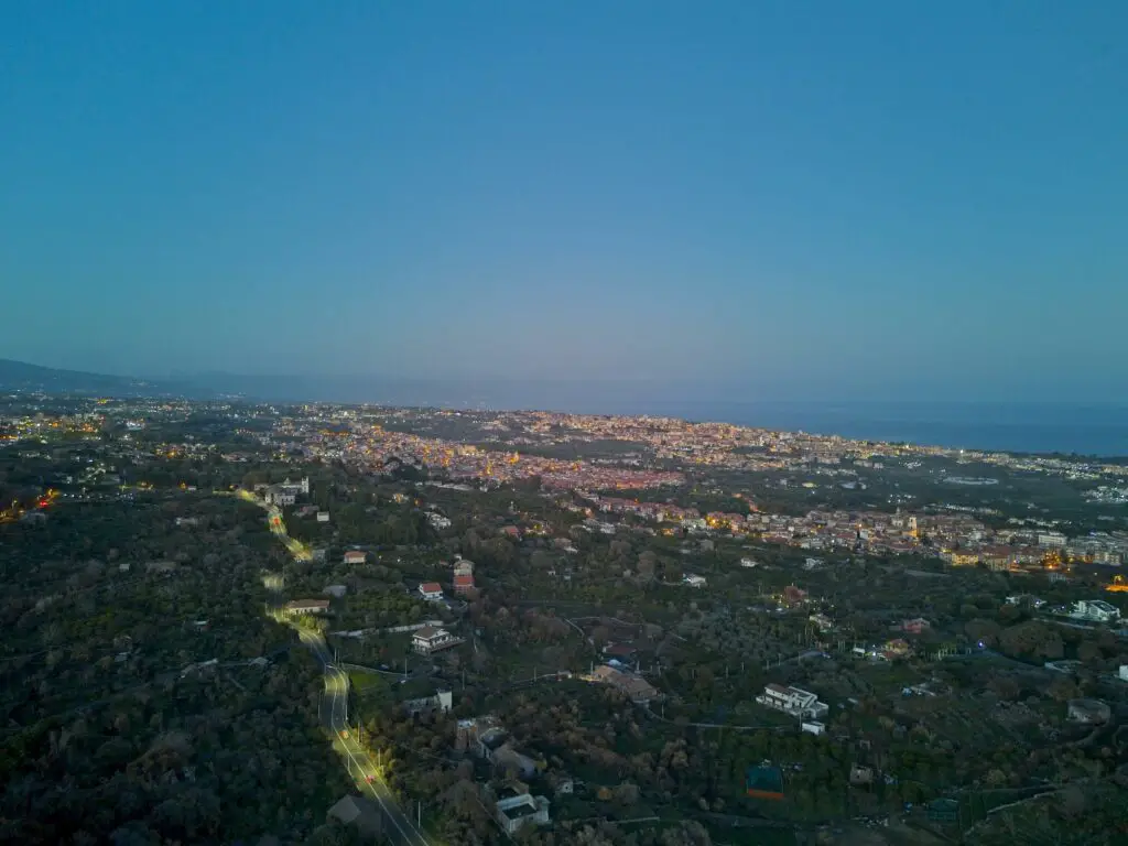 The town of Acireale in Sicily after sunset. Photo taken with a DJI Mini 4 Pro in 12 MP RAW format by Vicvideopic